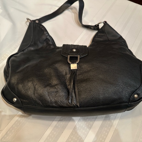 Black Leather Shoulder Bag with silver accents and black fringe - Picture 1 of 1